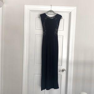 Boohoo long black dress with side slit. Lace sides and back.
